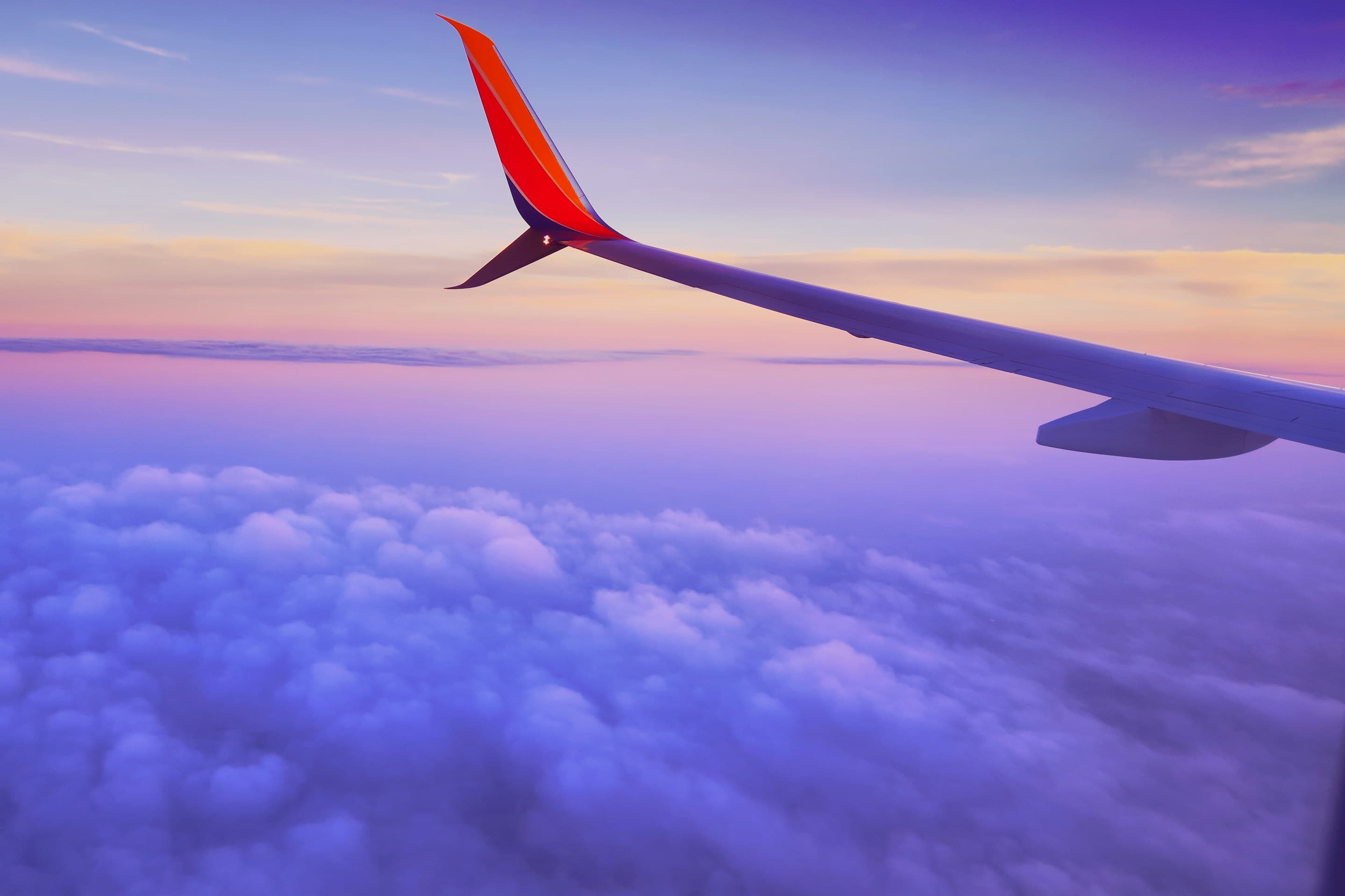 Aircraft wing above the clouds